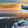 The Flag of Estonia On The Mountain.