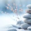 stack of pebbles or stones on winter outdoor background. Winter yoga